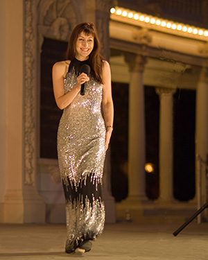 concert organist Carol Williams in a gold gown